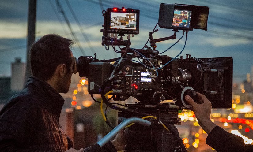 Professional cinema camera filming on location