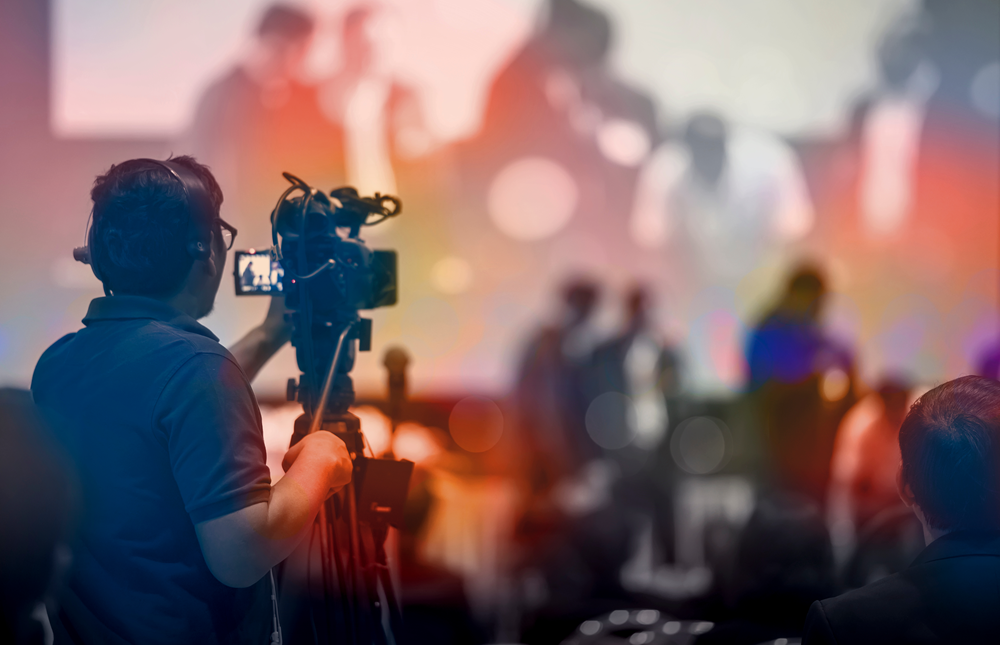 Videographer recording a live event